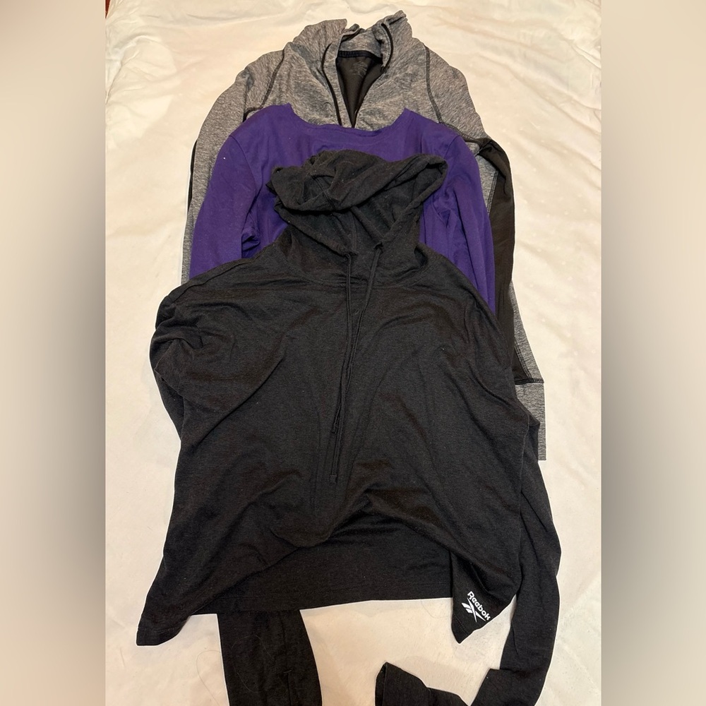 Bundle 3 long-sleeved workout shirts-- Nike, Reebok, Champion